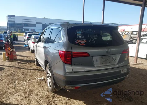 2017 Honda Pilot Touring from USA, damaged, VIN 5FNYF5H91HB016058